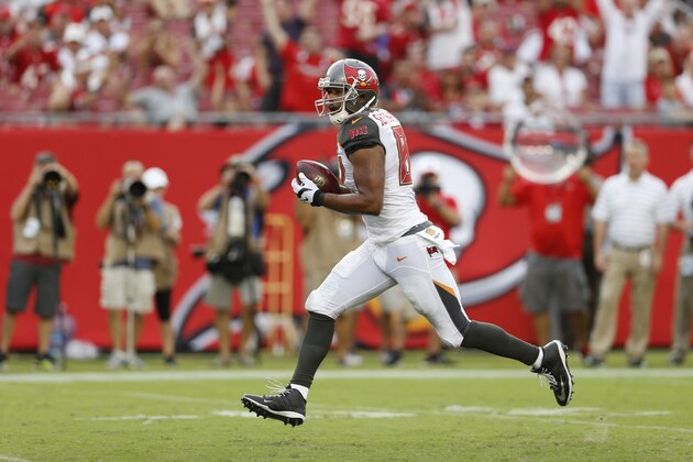 Tampa Bay Buccaneers tight end Austin Seferian-Jenkins (87) runs for a touchdown during the second half of an NFL football game against the Tennessee Titans, Sunday, Sept. 13, 2015, in Tampa, Fla. (AP Photo/Scott Audette)