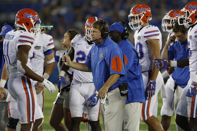 Sep 19, 2015; Lexington, KY, USA; Florida Gators head coach Jim McElwain instructs his team during the game against the Kentucky Wildcats in the first half at Commonwealth Stadium. Mandatory Credit: Mark Zerof-USA TODAY Sports