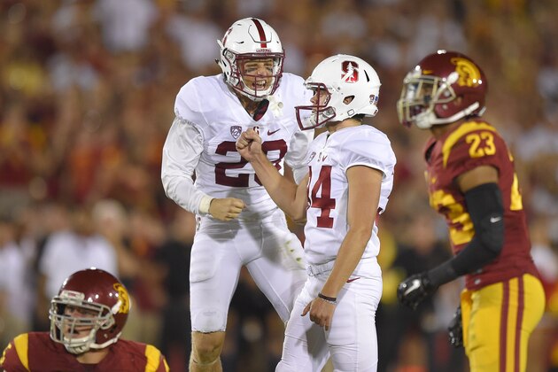Stanford's Conrad Ukropina, second from right, celebrates his 46-yard field goal along with safety Dallas Lloyd, as Southern California's Porter Gustin, left, and Jonathan Lockett watch during the second half of an NCAA college football game, Saturday, Sept. 19, 2015, in Los Angeles. Stanford won 41-31. (AP Photo/Mark J. Terrill)