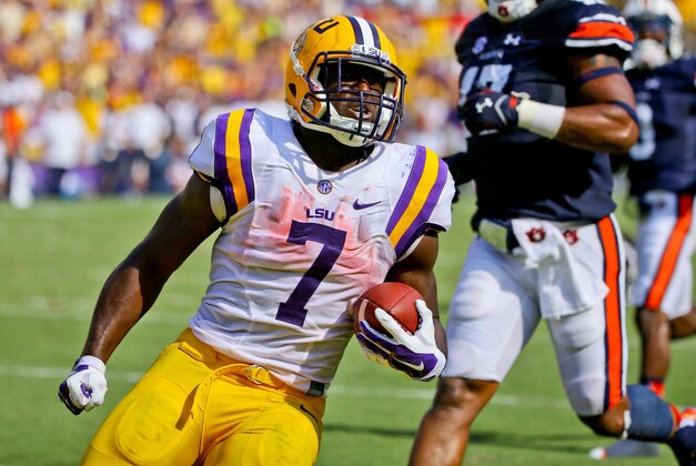 Sep 19, 2015; Baton Rouge, LA, USA; LSU Tigers running back Leonard Fournette (7) celebrates as he runs for a touchdown against the Auburn Tigers during the second quarter of a game at Tiger Stadium. Mandatory Credit: Derick E. Hingle-USA TODAY Sports