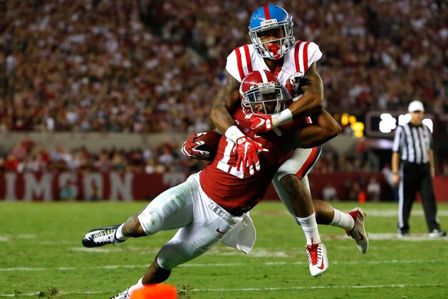 TUSCALOOSA, AL - SEPTEMBER 19:  Kailo Moore #13 of the Mississippi Rebels tackles Kenyan Drake #17 of the Alabama Crimson Tide at Bryant-Denny Stadium on September 19, 2015 in Tuscaloosa, Alabama.  (Photo by Kevin C. Cox/Getty Images)