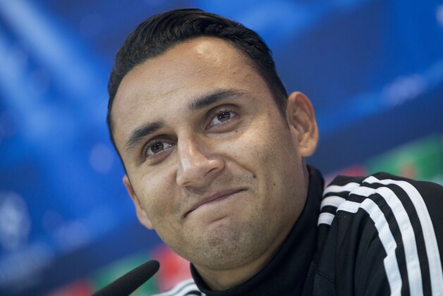 Real Madrid's goalkeeper Keylor Navas smiles during a press conference in Madrid, Spain, Monday Dec. 8, 2014. Real Madrid will play Ludogorets Tuesday in a Group B Champions League soccer match. (AP Photo/Paul White)