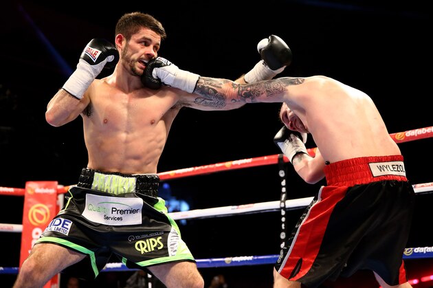 SHEFFIELD, ENGLAND - MARCH 28:  Stephen Smith (L) of Great Britain lands a blow on Jacek Wylezol of Poland during a super featherweight contest at Motorpoint Arena on March 28, 2015 in Sheffield, England.  (Photo by Richard Heathcote/Getty Images)