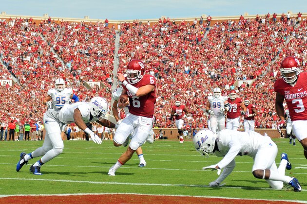 NORMAN, OK - SEPTEMBER 19: Quarterback Baker Mayfield #6 of the Oklahoma Sooners runs for a touchdown against the Tulsa Golden Hurricane at Gaylord Family Memorial Stadium on September 19, 2015 in Norman, Oklahoma. (Photo by Jackson Laizure/Getty Images)