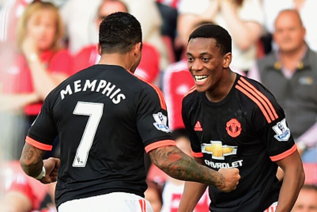 SOUTHAMPTON, ENGLAND - SEPTEMBER 20:  Anthony Martial of Manchester United (9) celebrates with Memphis Depay as he scores his and his team's second goal during the Barclays Premier League match between Southampton and Manchester United at St Mary's Stadium on September 20, 2015 in Southampton, United Kingdom.  (Photo by Alex Broadway/Getty Images)