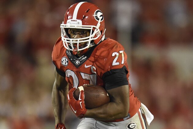 Sep 19, 2015; Athens, GA, USA; Georgia Bulldogs running back Nick Chubb (27) runs the ball against the South Carolina Gamecocks during the second half at Sanford Stadium. Georgia defeated South Carolina 52-20. Mandatory Credit: Dale Zanine-USA TODAY Sports