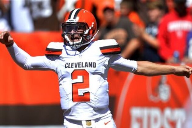 Cleveland Browns quarterback Johnny Manziel celebrates after a 60-yard touchdown pass to wide receiver Travis Benjamin in the first half of an NFL football game against the Tennessee Titans, Sunday, Sept. 20, 2015, in Cleveland. (AP Photo/David Richard)