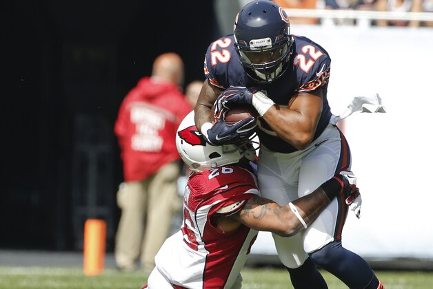 Sep 20, 2015; Chicago, IL, USA; Chicago Bears running back Matt Forte (22) is tackled by Arizona Cardinals free safety Rashad Johnson (26) during the first quarter of the NFL game at Soldier Field. Mandatory Credit: Kamil Krzaczynski-USA TODAY Sports Sep 20, 2015; Chicago, IL, USA; Chicago Bears running back Matt Forte (22) is tackled by Arizona Cardinals free safety Rashad Johnson (26) during the first quarter of the NFL game at Soldier Field. Mandatory Credit: Kamil Krzaczynski-USA TODAY Sports