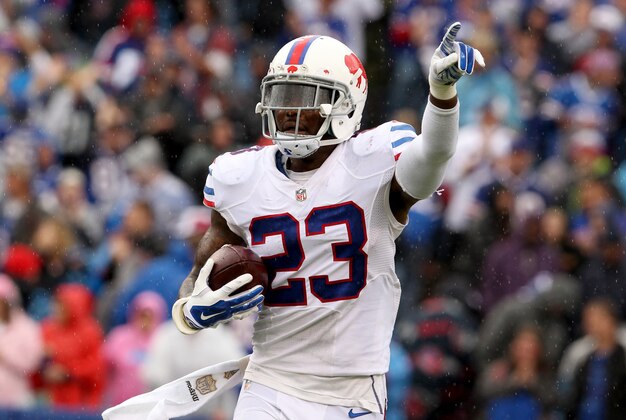 Sep 13, 2015; Orchard Park, NY, USA; Buffalo Bills free safety Aaron Williams (23) celebrates his fourth quarter interception against the Indianapolis Colts at Ralph Wilson Stadium. Bills beat the Colts 27 to 14.  Mandatory Credit: Timothy T. Ludwig-USA TODAY Sports