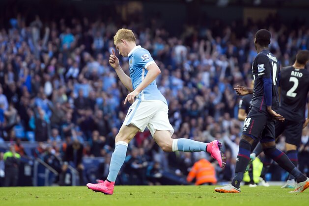 Manchester City's Kevin De Bruyne celebrates after  scoring during the English Premier League soccer match between Manchester City and West Ham United at the Etihad Stadium, Manchester, England, Saturday Sept. 19, 2015. (AP Photo/Jon Super)