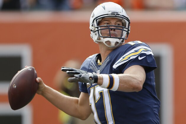 San Diego Chargers quarterback Philip Rivers throws in the second half of an NFL football game against the Cincinnati Bengals, Sunday, Sept. 20, 2015, in Cincinnati. (AP Photo/Gary Landers)