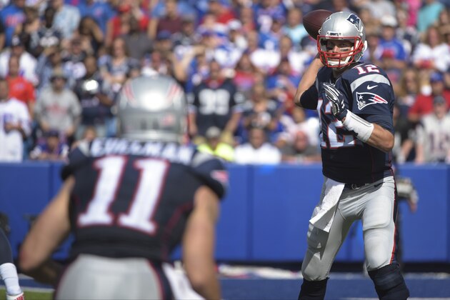 New England Patriots quarterback Tom Brady (12) throws a pass  to Julian Edelman (11) during the second half of an NFL football game Sunday, Sept. 20, 2015, in Orchard Park, N.Y. (AP Photo/Gary Wiepert)