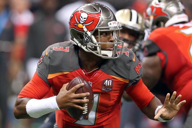 Sep 20, 2015; New Orleans, LA, USA; Tampa Bay Buccaneers quarterback Jameis Winston (3) carries the ball against the New Orleans Saints in the second half at the Mercedes-Benz Superdome. The Tampa Bay Buccaneers won, 23-19.Mandatory Credit: Chuck Cook-USA TODAY Sports