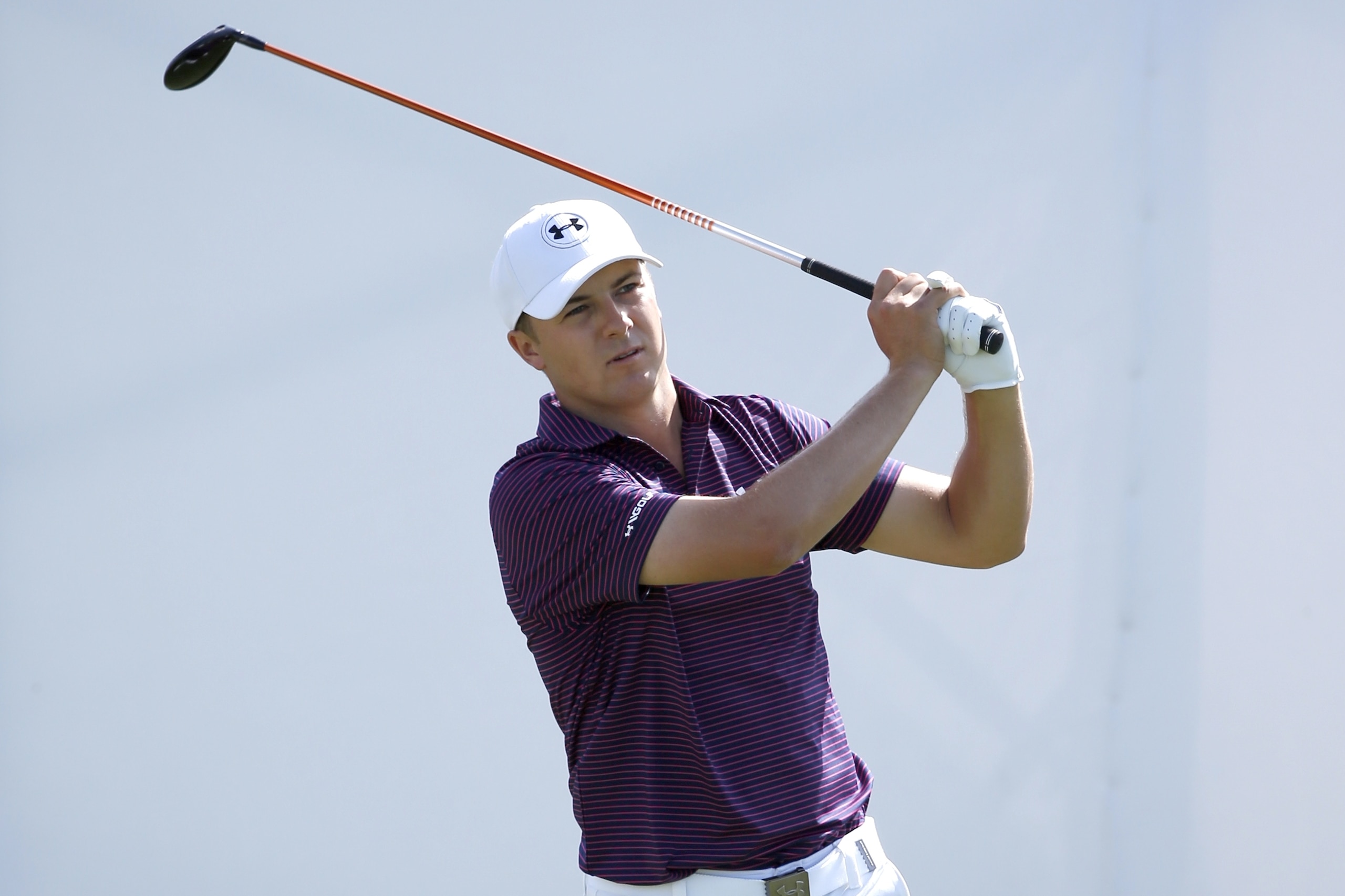 Jordan Spieth watches his tee shot on the first hole during the final round of the BMW Championship golf tournament at Conway Farms Golf Club, Sunday, Sept. 20, 2015, in Lake Forest, Ill. (AP Photo/Charles Rex Arbogast)