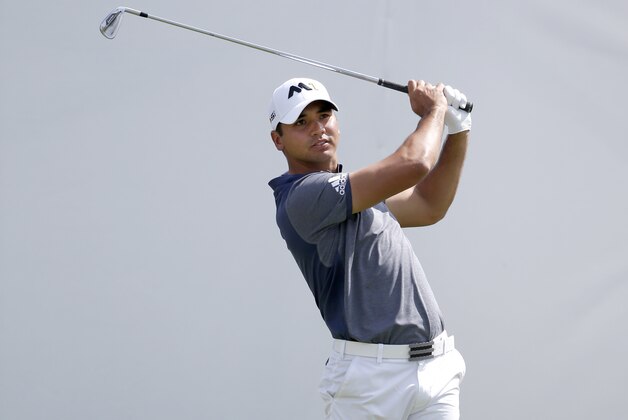 Jason Day of Australia, watches his tee shot on the first hole during the final round of the BMW Championship golf tournament at Conway Farms Golf Club, Sunday, Sept. 20, 2015, in Lake Forest, Ill. (AP Photo/Charles Rex Arbogast)