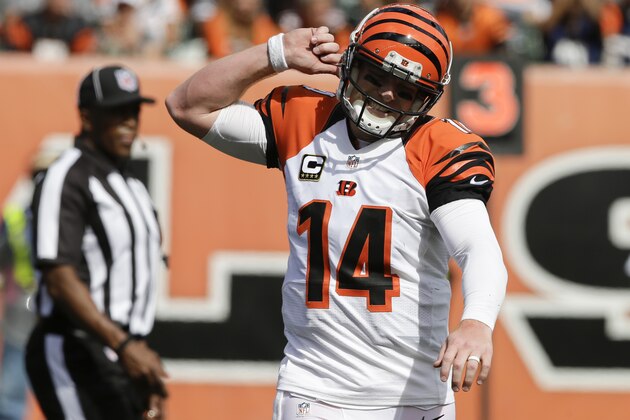 Cincinnati Bengals quarterback Andy Dalton reacts after throwing an incomplete pass in the second half of an NFL football game against the San Diego Chargers, Sunday, Sept. 20, 2015, in Cincinnati. (AP Photo/Darron Cummings)