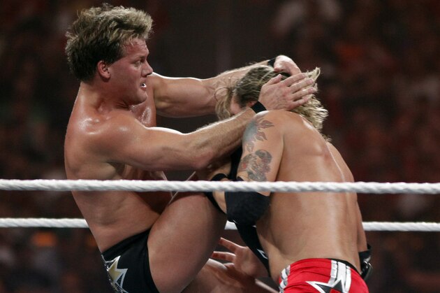 WWE Superstar Chris Jericho retains his World Heavyweight Championship vs. Edge during WrestleMania XXVI on March 28, 2010, at University of Phoenix Stadium in Glendale, Arizona. (AP Photo/Rick Scuteri)
