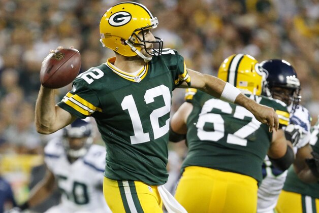Green Bay Packers' Aaron Rodgers during the first half of an NFL football game against the Seattle Seahawks Sunday, Sept. 20, 2015, in Green Bay, Wis. (AP Photo/Mike Roemer)