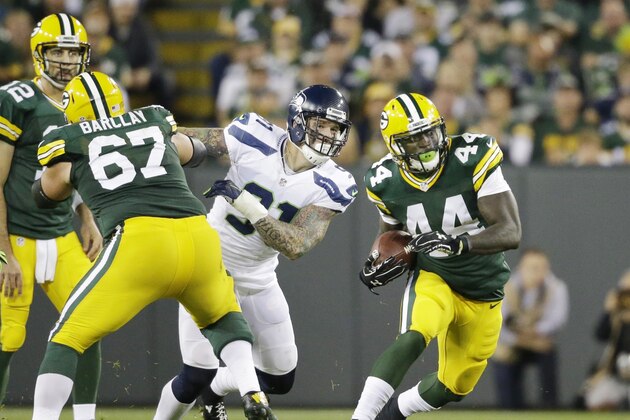 Green Bay Packers' James Starks runs during the first half of an NFL football game against the Seattle Seahawks Sunday, Sept. 20, 2015, in Green Bay, Wis. (AP Photo/Jeffrey Phelps)