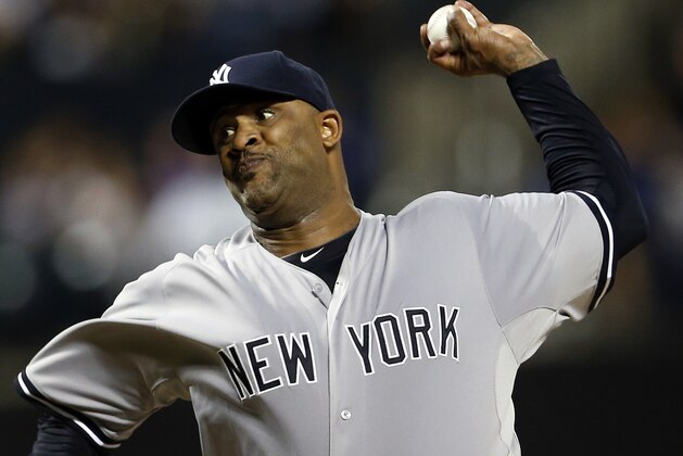 NEW YORK, NY - SEPTEMBER 20: CC Sabathia #52 of the New York Yankees pitches during the second inning against the New York Mets at Citi Field on September 20, 2015 in the Queens borough of New York City. (Photo by Adam Hunger/Getty Images)