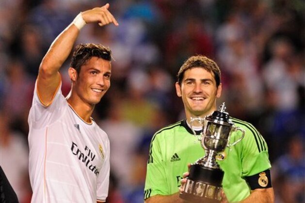 IMAGE DISTRIBUTED FOR GUINNESS INTERNATIONAL CHAMPIONS CUP - Real Madrid forward Cristiano Ronaldo (7) celebrates their win with Real Madrid goalkeeper Iker Casillas (1) over Chelsea the championship match during the Guinness International Champions at Sun Life Stadium on Wednesday Aug. 7, 2013 in Miami Gardens, Florida. (Scott A. Miller / AP Images for Guinness International Champions Cup)