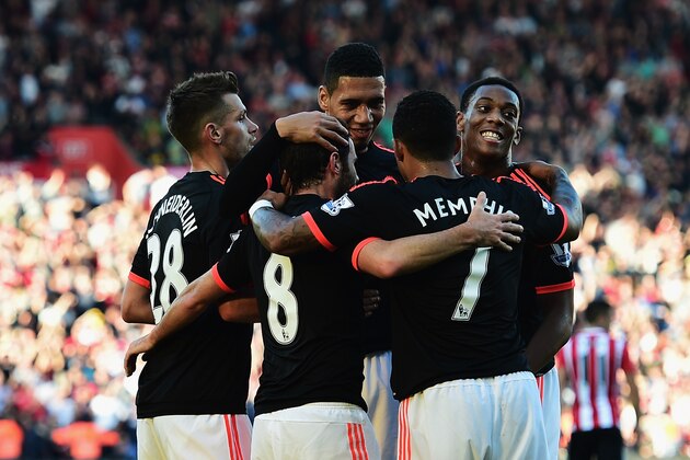 SOUTHAMPTON, ENGLAND - SEPTEMBER 20:  Juan Mata of Manchester United (8) celebrates with team mates as he scores their third goal during the Barclays Premier League match between Southampton and Manchester United at St Mary's Stadium on September 20, 2015 in Southampton, United Kingdom.  (Photo by Alex Broadway/Getty Images)