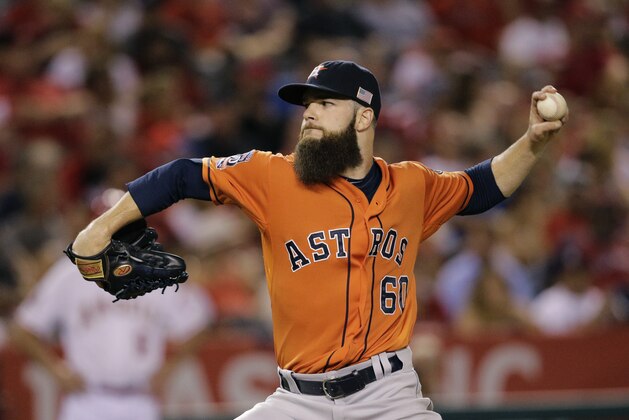 Houston Astros starting pitcher Dallas Keuchel throws against the Los Angeles Angels during the fourth inning of a baseball game, Friday, Sept. 11, 2015, in Anaheim, Calif. (AP Photo/Jae C. Hong)