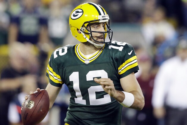 Green Bay Packers' Aaron Rodgers drops back during the first half of an NFL football game against the Seattle Seahawks Sunday, Sept. 20, 2015, in Green Bay, Wis. (AP Photo/Jeffrey Phelps)