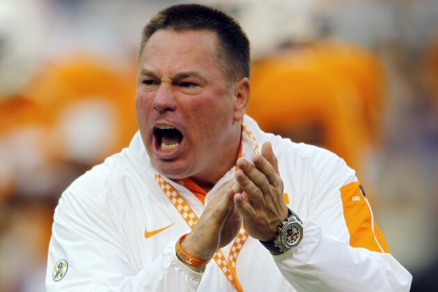 Tennessee head coach Butch Jones yells to his players during warmups before an NCAA college football game against Western Carolina, Saturday, Sept. 19, 2015, in Knoxville, Tenn. (AP Photo/Wade Payne)