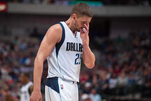 Mar 20, 2015; Dallas, TX, USA; Dallas Mavericks forward Chandler Parsons (25) walks off the court during the game against the Memphis Grizzlies at the American Airlines Center. The Grizzlies defeated the Mavericks 112-101. Mandatory Credit: Jerome Miron-USA TODAY Sports