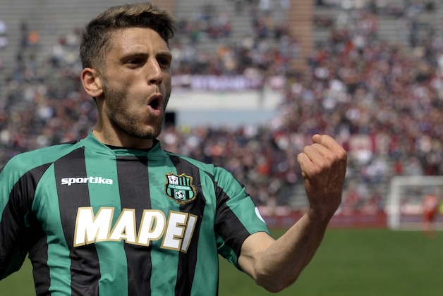 Sassuolo's Domenico Berardi celebrates after scoring a goal during their Serie A soccer match against Torino, at Reggio Emilia's Mapei stadium, Italy, Sunday, April 19, 2015. (AP Photo/Marco Vasini)