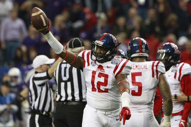 Dec 30, 2013; Nashville, TN, USA; Mississippi Rebels defensive back Tony Conner (12) celebrates sacking Georgia Tech Yellow Jackets quarterback Vad Lee (2) (not pictured) during the first half at LP Field. Mandatory Credit: Jim Brown-USA TODAY Sports