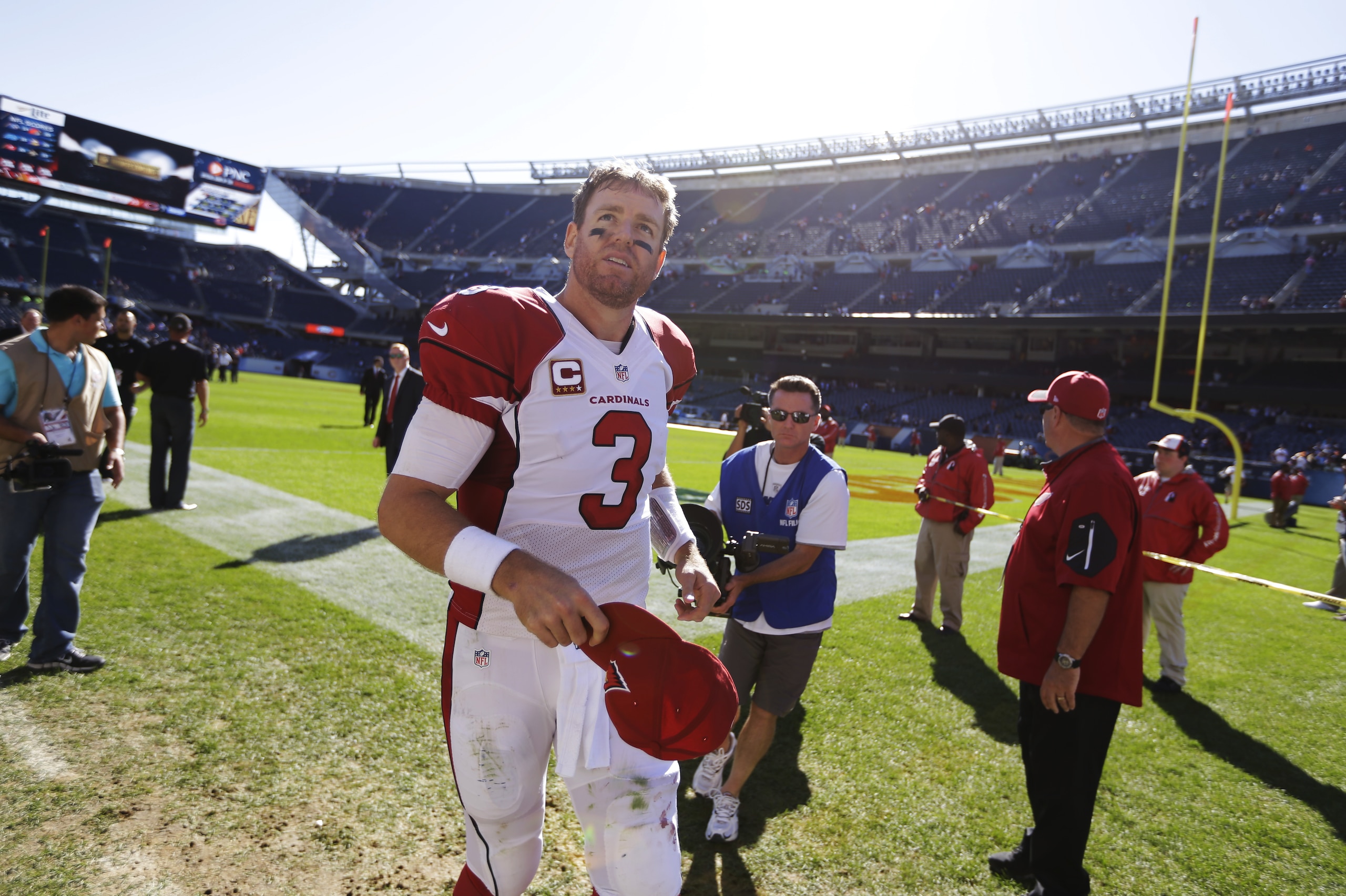 Arizona Cardinals quarterback Carson Palmer (3) runs off the field after an NFL football game against the Chicago Bears, Sunday, Sept. 20, 2015, in Chicago. The Cardinals won 48-23. (AP Photo/Michael Conroy) Arizona Cardinals quarterback Carson Palmer (3) runs off the field after an NFL football game against the Chicago Bears, Sunday, Sept. 20, 2015, in Chicago. The Cardinals won 48-23. (AP Photo/Michael Conroy)