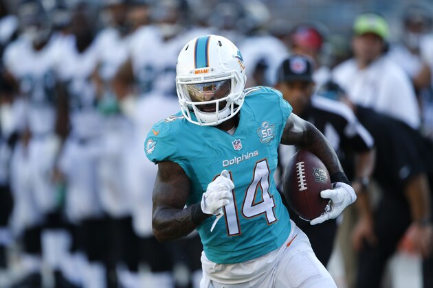Miami Dolphins wide receiver Jarvis Landry (14) runs against the Jacksonville Jaguars during the second half of an NFL football game in Jacksonville, Fla., Sunday, Sept. 20, 2015.(AP Photo/Stephen B. Morton)