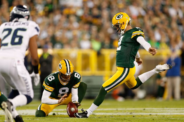 GREEN BAY, WI - SEPTEMBER 20:  Kicker Mason Crosby #2 of the Green Bay Packers kicks a 55 yard field goal against the Seattle Seahawks during the first quarter of the NFL game at Lambeau Field on September 20, 2015 in Green Bay, Wisconsin. The Packers defeated the Seahawks 27-17.  (Photo by Christian Petersen/Getty Images)