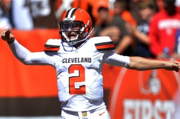 Cleveland Browns quarterback Johnny Manziel celebrates after a 60-yard touchdown pass to wide receiver Travis Benjamin in the first half of an NFL football game against the Tennessee Titans, Sunday, Sept. 20, 2015, in Cleveland. (AP Photo/David Richard) Cleveland Browns quarterback Johnny Manziel celebrates after a 60-yard touchdown pass to wide receiver Travis Benjamin in the first half of an NFL football game against the Tennessee Titans, Sunday, Sept. 20, 2015, in Cleveland. (AP Photo/David Richard)