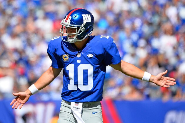 EAST RUTHERFORD, NJ - SEPTEMBER 20:  Eli Manning #10 of the New York Giants reacts against the Atlanta Falcons during the first half  at MetLife Stadium on September 20, 2015 in East Rutherford, New Jersey.  (Photo by Alex Goodlett/Getty Images)
