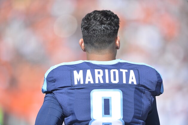 Tennessee Titans quarterback Marcus Mariota stands on the sideline against the Cleveland Browns Sunday, Sept. 20, 2015, in Cleveland. The Browns won 28-14. (AP Photo/David Richard)