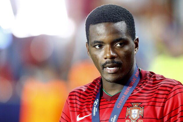 Portugal’s William Carvalho, who failed to score with his penalty reacts after the final match at the Euro U21 soccer championship between Sweden and Portugal at the Eden stadium in Prague, Czech Republic, Tuesday, June 30, 2015. (AP Photo/Matthias Schrader)