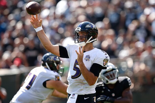 OAKLAND, CA - SEPTEMBER 20:  Joe Flacco releases the ball against the Oakland Raiders at Oakland-Alameda County Coliseum on September 20, 2015 in Oakland, California.  (Photo by Ezra Shaw/Getty Images)