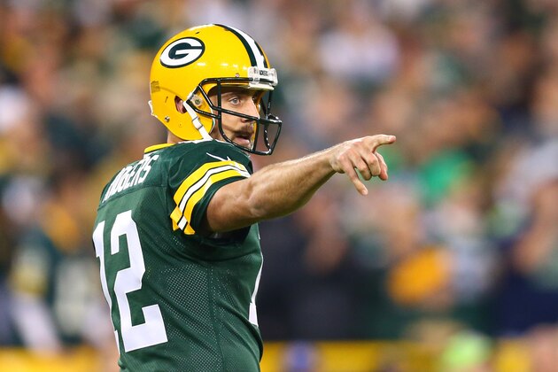 GREEN BAY, WI - SEPTEMBER 20:  Aaron Rodgers #12 of the Green Bay Packers calls a play in the first quarter against the Seattle Seahawks during their game at Lambeau Field on September 20, 2015 in Green Bay, Wisconsin.  (Photo by Maddie Meyer/Getty Images)