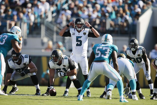 Jacksonville Jaguars quarterback Blake Bortles (5) calls an audible at the line of scrimmage against the Miami Dolphins during the first half of an NFL football game, Sunday, Sept. 20, 2015, in Jacksonville, Fla. (AP Photo/Stephen B. Morton)