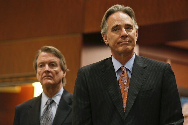 University of Texas athletic director Steve Patterson, right, and school president Bill Powers listen as Mack Brown, announces that he is stepping down as head football coach  in Austin, Texas on Sunday, Dec. 15, 2013. The Longhorns have had four straight seasons with at least four losses. Texas went 8-4 this year and Brown's final game will be the Dec. 30 Alamo Bowl against Oregon. (AP Photo/Jack Plunkett)