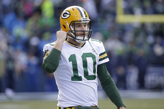 Green Bay Packers quarterback Matt Flynn (10) warms up before the NFL football NFC Championship game against the Seattle Seahawks Sunday, Jan. 18, 2015, in Seattle. (AP Photo/Elaine Thompson)