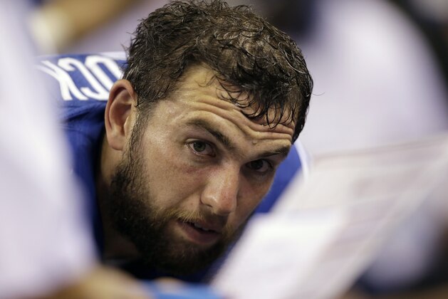Indianapolis Colts quarterback Andrew Luck (12) talks on the bench in the second half of an NFL football game against the New York Jets in Indianapolis, Monday, Sept. 21, 2015.  (AP Photo/AJ Mast)