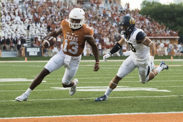 AUSTIN, TX - SEPTEMBER 19:  Jerrod Heard #13 of the Texas Longhorns scrambles for a 2 yard touchdown run against the California Golden Bears during the first quarter on September 19, 2015 at Darrell K Royal-Texas Memorial Stadium in Austin, Texas.  (Photo by Cooper Neill/Getty Images)