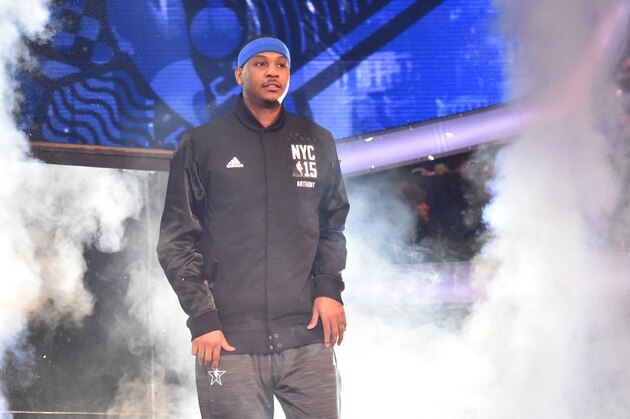 NEW YORK,NY - FEBRUARY 15: Carmelo Anthony #7 playing for the East Coast all-stars comes out to the crowd prior to the 2015 NBA All-Star Game at Madison Square Garden on February 15, 2015 in New York,New York NOTE TO USER: User expressly acknowledges and agrees that, by downloading and/or using this Photograph, user is consenting to the terms and conditions of the Getty Images License Agreement. Mandatory Copyright Notice: Copyright 2015 NBAE (Photo by Jesse D. Garrabrant/NBAE via Getty Images)