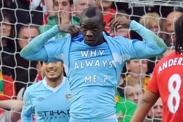 Manchester City's Italian striker Mario Balotelli celebrates scoring the opening goal of the English Premier League football match between Manchester United and Manchester City at Old Trafford in Manchester, north-west England on October 23, 2011. AFP PHOTO/ANDREW YATES

RESTRICTED TO EDITORIAL USE. No use with unauthorized audio, video, data, fixture lists, club/league logos or “live” services. Online in-match use limited to 45 images, no video emulation. No use in betting, games or single club/league/player publications (Photo credit should read ANDREW YATES/AFP/Getty Images)