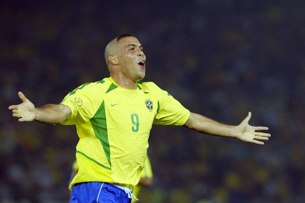 Brazil's forward Ronaldo celebrates after scoring the second goal against Germany during match 64 of the 2002 FIFA World Cup Korea Japan final 30 June, 2002 in Yokohama, Japan. Brazil won the championship 2-0, having now won a record five World Cup titles.AFP PHOTO GABRIEL BOUYS        (Photo credit should read GABRIEL BOUYS/AFP/Getty Images)