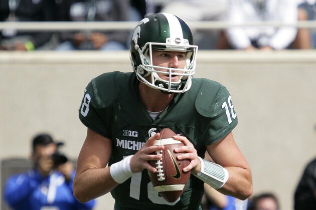 Michigan State quarterback Connor Cook rolls out against Air Force during the fourth quarter of an NCAA college football game, Saturday, Sept. 19, 2015, in East Lansing, Mich. Michigan State won 35-21. (AP Photo/Al Goldis)